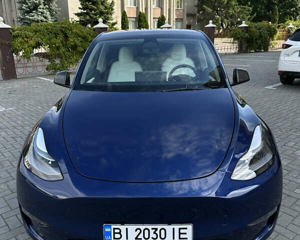 Синий Тесла Model Y, объемом двигателя 0 л и пробегом 65 тыс. км за 26500 $, фото 1 на Automoto.ua