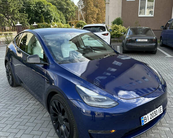 Синий Тесла Model Y, объемом двигателя 0 л и пробегом 26 тыс. км за 30000 $, фото 1 на Automoto.ua