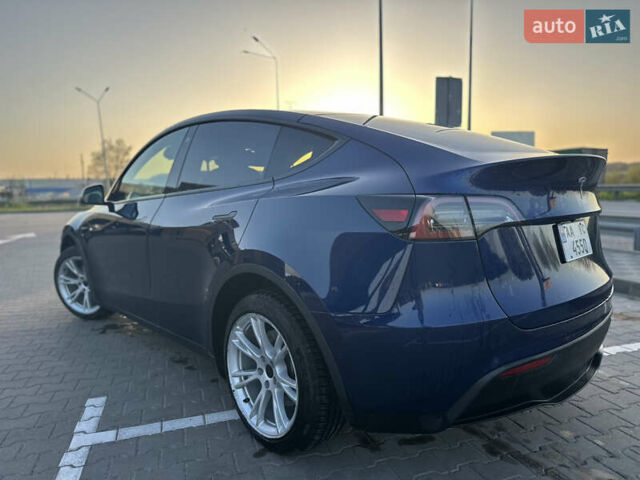 Синий Тесла Model Y, объемом двигателя 0 л и пробегом 86 тыс. км за 25000 $, фото 1 на Automoto.ua