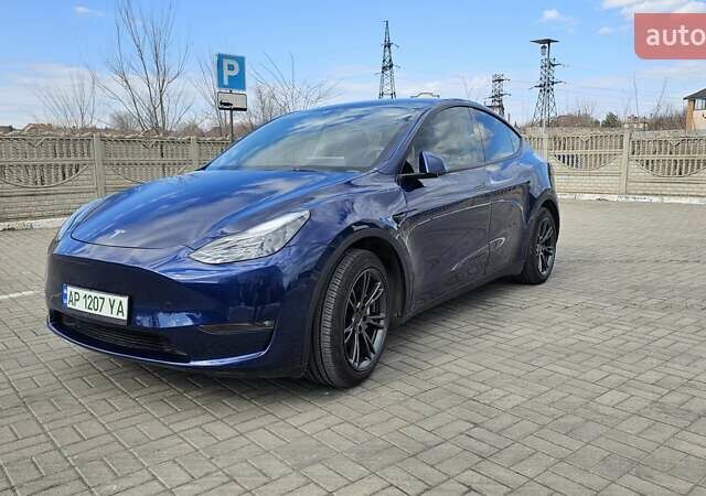 Синий Тесла Model Y, объемом двигателя 0 л и пробегом 45 тыс. км за 28500 $, фото 1 на Automoto.ua