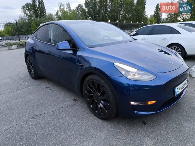 Синий Тесла Model Y, объемом двигателя 0 л и пробегом 45 тыс. км за 24990 $, фото 1 на Automoto.ua