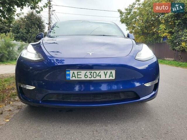 Синий Тесла Model Y, объемом двигателя 0 л и пробегом 63 тыс. км за 26500 $, фото 1 на Automoto.ua