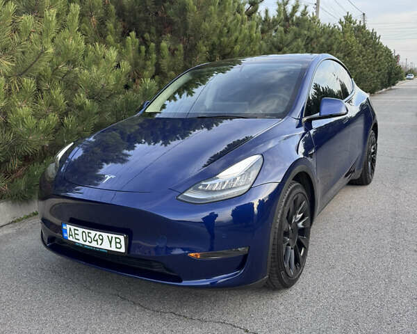 Синий Тесла Model Y, объемом двигателя 0 л и пробегом 52 тыс. км за 30900 $, фото 1 на Automoto.ua