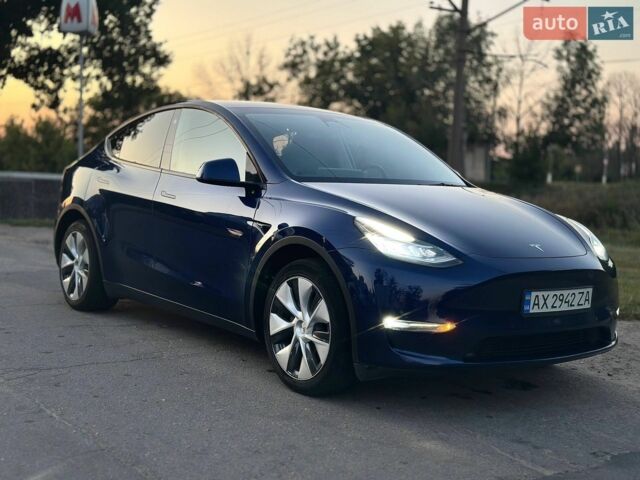 Синий Тесла Model Y, объемом двигателя 0 л и пробегом 55 тыс. км за 27500 $, фото 1 на Automoto.ua