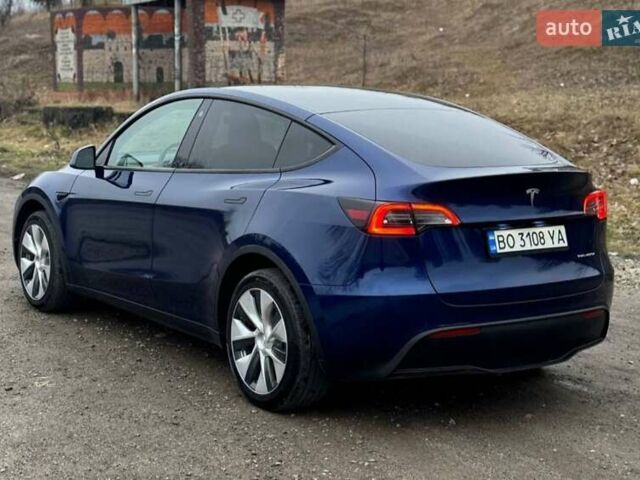 Синий Тесла Model Y, объемом двигателя 0 л и пробегом 31 тыс. км за 28300 $, фото 1 на Automoto.ua