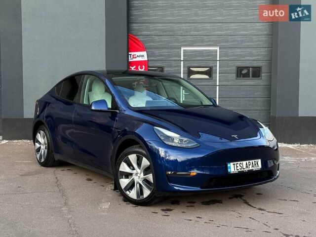 Синий Тесла Model Y, объемом двигателя 0 л и пробегом 59 тыс. км за 32999 $, фото 1 на Automoto.ua