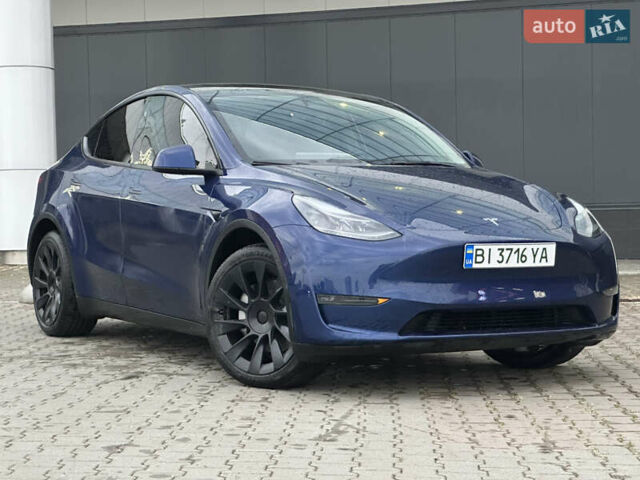 Синий Тесла Model Y, объемом двигателя 0 л и пробегом 36 тыс. км за 33000 $, фото 1 на Automoto.ua