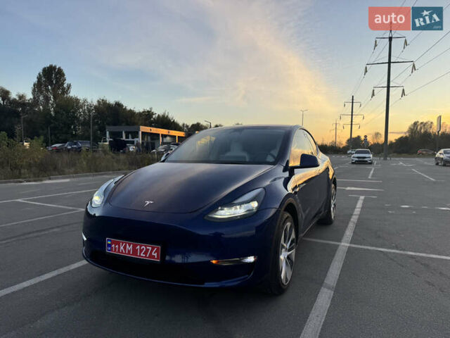 Синий Тесла Model Y, объемом двигателя 0 л и пробегом 60 тыс. км за 26900 $, фото 1 на Automoto.ua