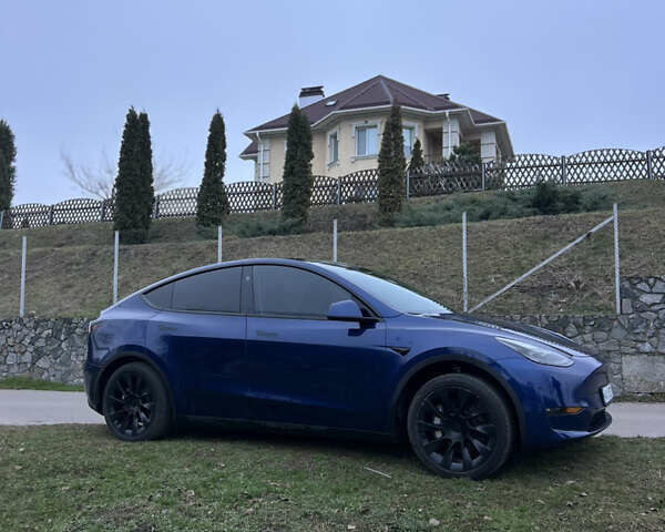 Синий Тесла Model Y, объемом двигателя 0 л и пробегом 32 тыс. км за 28500 $, фото 1 на Automoto.ua
