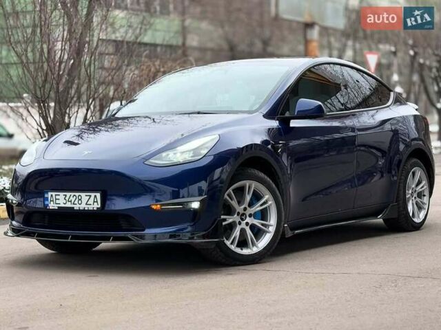 Синий Тесла Model Y, объемом двигателя 0 л и пробегом 14 тыс. км за 27600 $, фото 1 на Automoto.ua