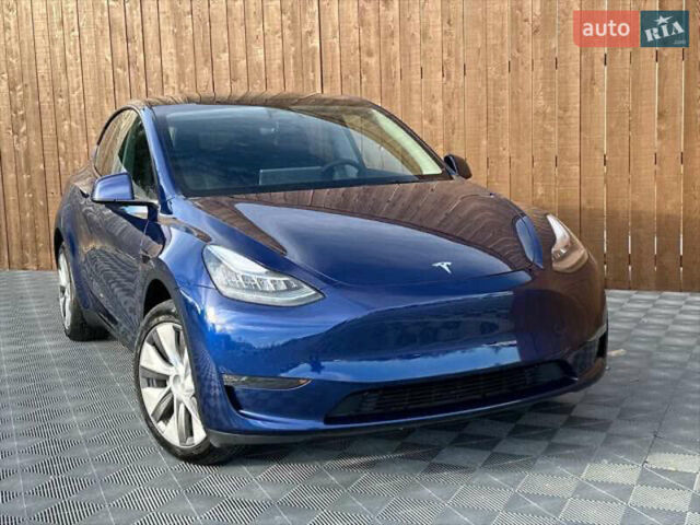 Синий Тесла Model Y, объемом двигателя 0 л и пробегом 22 тыс. км за 26000 $, фото 1 на Automoto.ua