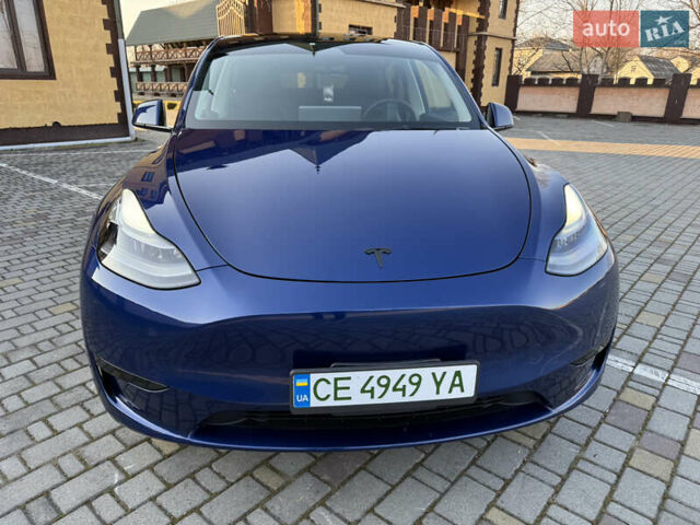Синий Тесла Model Y, объемом двигателя 0 л и пробегом 27 тыс. км за 28100 $, фото 1 на Automoto.ua