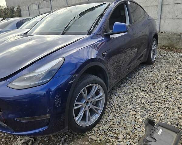 Синий Тесла Model Y, объемом двигателя 0 л и пробегом 42 тыс. км за 21800 $, фото 1 на Automoto.ua