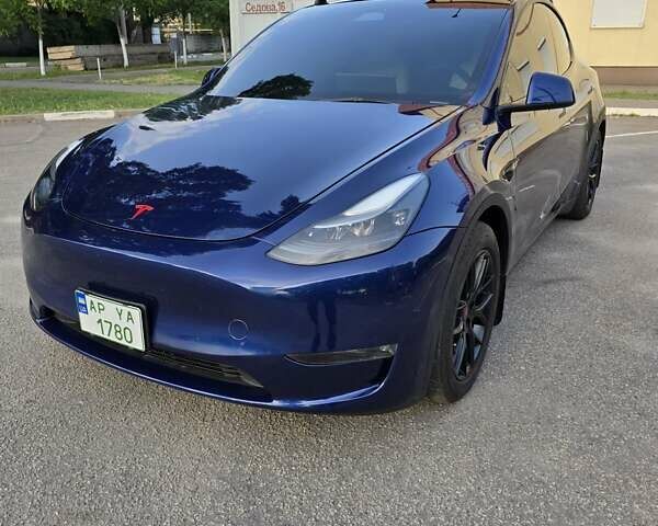 Синий Тесла Model Y, объемом двигателя 0 л и пробегом 51 тыс. км за 26400 $, фото 1 на Automoto.ua