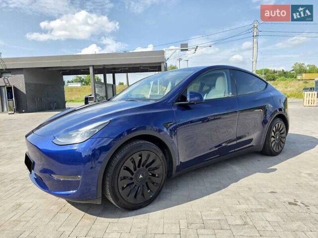 Синий Тесла Model Y, объемом двигателя 0 л и пробегом 42 тыс. км за 26500 $, фото 1 на Automoto.ua