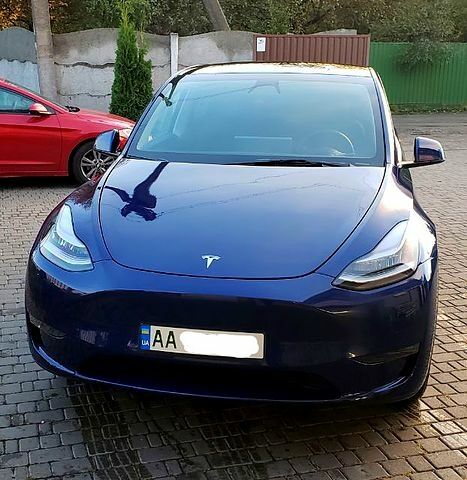 Синий Тесла Model Y, объемом двигателя 0.39 л и пробегом 1000 тыс. км за 32000 $, фото 1 на Automoto.ua