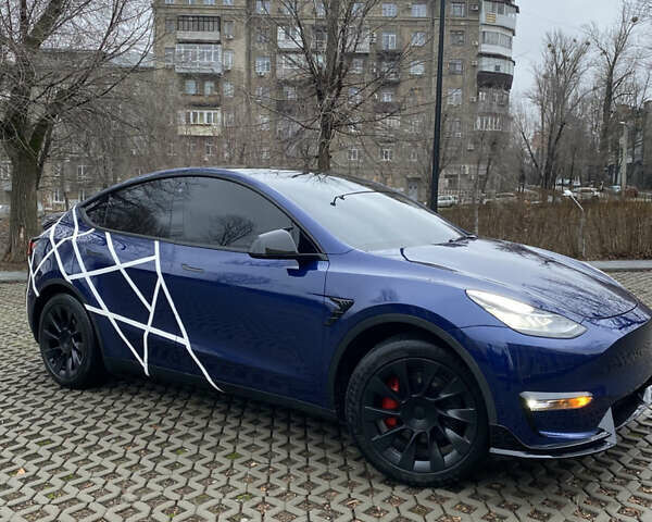 Синий Тесла Model Y, объемом двигателя 0 л и пробегом 32 тыс. км за 29400 $, фото 1 на Automoto.ua