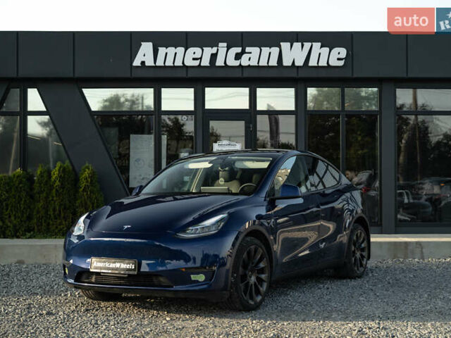Синий Тесла Model Y, объемом двигателя 0 л и пробегом 79 тыс. км за 31900 $, фото 1 на Automoto.ua