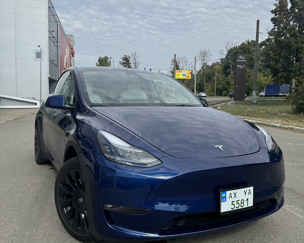 Синий Тесла Model Y, объемом двигателя 0 л и пробегом 10 тыс. км за 25000 $, фото 1 на Automoto.ua