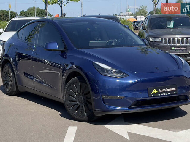 Синий Тесла Model Y, объемом двигателя 0 л и пробегом 30 тыс. км за 32900 $, фото 1 на Automoto.ua