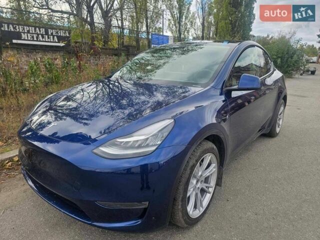 Синий Тесла Model Y, объемом двигателя 0 л и пробегом 57 тыс. км за 27000 $, фото 1 на Automoto.ua