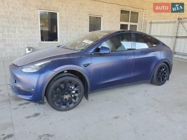 Синий Тесла Model Y, объемом двигателя 0 л и пробегом 23 тыс. км за 23000 $, фото 1 на Automoto.ua