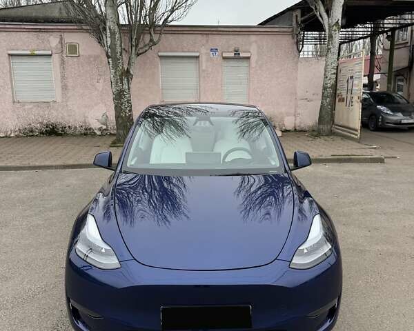 Синий Тесла Model Y, объемом двигателя 0 л и пробегом 27 тыс. км за 25999 $, фото 1 на Automoto.ua