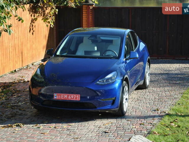 Синій Тесла Model Y, об'ємом двигуна 0 л та пробігом 24 тис. км за 26400 $, фото 1 на Automoto.ua