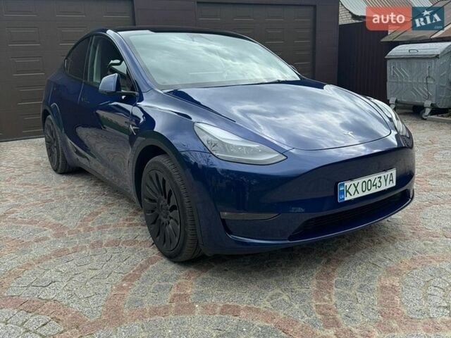 Синий Тесла Model Y, объемом двигателя 0 л и пробегом 40 тыс. км за 29800 $, фото 1 на Automoto.ua