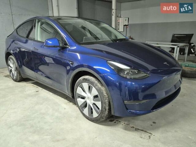 Синий Тесла Model Y, объемом двигателя 0 л и пробегом 44 тыс. км за 25000 $, фото 1 на Automoto.ua