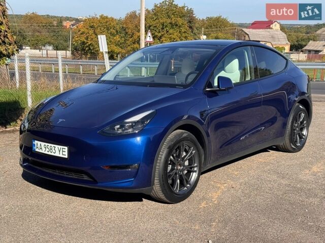 Синий Тесла Model Y, объемом двигателя 0 л и пробегом 22 тыс. км за 28100 $, фото 1 на Automoto.ua