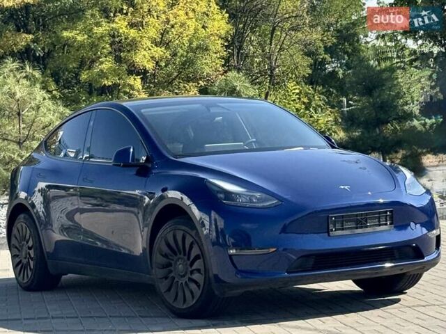 Синій Тесла Model Y, об'ємом двигуна 0 л та пробігом 18 тис. км за 31499 $, фото 1 на Automoto.ua