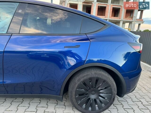Синий Тесла Model Y, объемом двигателя 0 л и пробегом 41 тыс. км за 28900 $, фото 1 на Automoto.ua