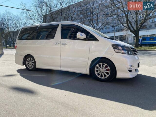 Белый Тойота Алфард, объемом двигателя 2.4 л и пробегом 180 тыс. км за 15000 $, фото 1 на Automoto.ua