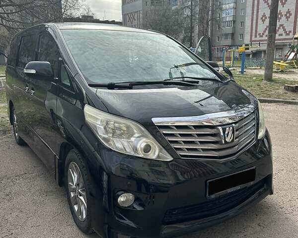 Черный Тойота Алфард, объемом двигателя 2.4 л и пробегом 103 тыс. км за 19000 $, фото 1 на Automoto.ua