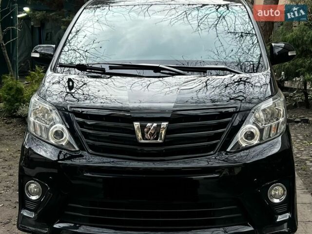 Черный Тойота Алфард, объемом двигателя 2.4 л и пробегом 130 тыс. км за 21500 $, фото 1 на Automoto.ua