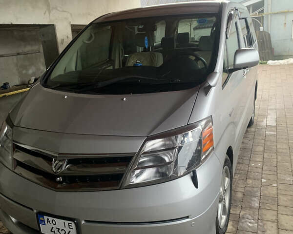 Серый Тойота Алфард, объемом двигателя 2.36 л и пробегом 256 тыс. км за 12000 $, фото 1 на Automoto.ua