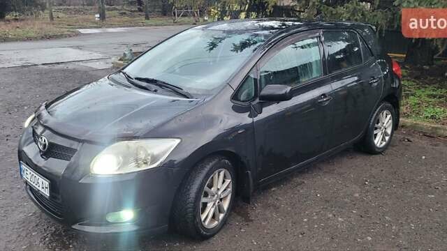 Чорний Тойота Ауріс, об'ємом двигуна 1.8 л та пробігом 235 тис. км за 8200 $, фото 1 на Automoto.ua