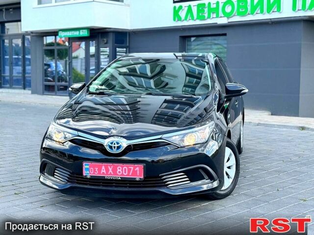 Черный Тойота Аурис, объемом двигателя 1.8 л и пробегом 163 тыс. км за 12950 $, фото 1 на Automoto.ua