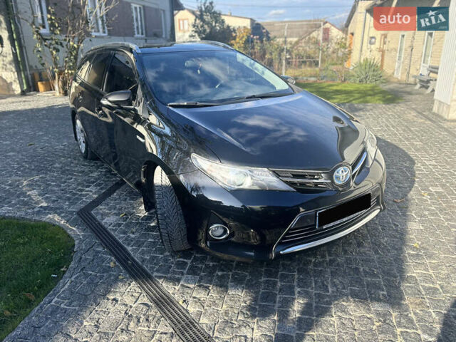 Черный Тойота Аурис, объемом двигателя 1.8 л и пробегом 318 тыс. км за 12500 $, фото 1 на Automoto.ua