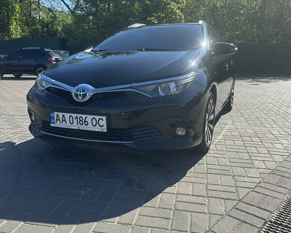 Черный Тойота Аурис, объемом двигателя 1.8 л и пробегом 233 тыс. км за 12500 $, фото 1 на Automoto.ua