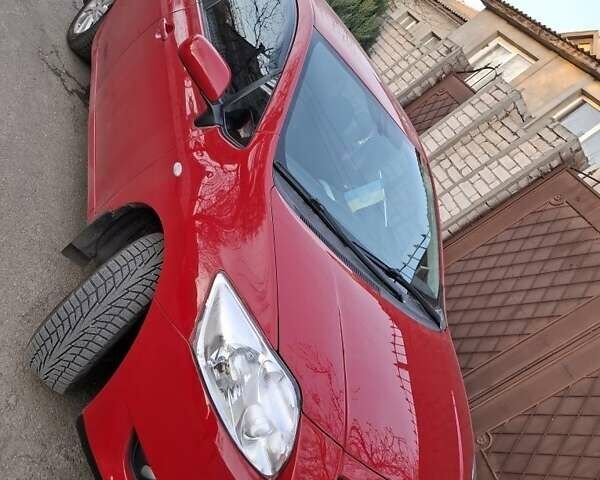 Красный Тойота Аурис, объемом двигателя 1.6 л и пробегом 196 тыс. км за 6800 $, фото 1 на Automoto.ua