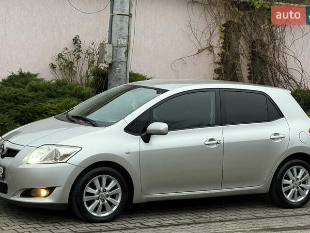 Сірий Тойота Ауріс, об'ємом двигуна 2 л та пробігом 219 тис. км за 6999 $, фото 1 на Automoto.ua