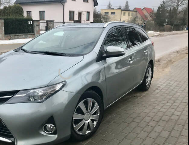 Серый Тойота Аурис, объемом двигателя 1.36 л и пробегом 256 тыс. км за 7600 $, фото 1 на Automoto.ua