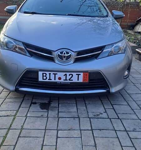 Сірий Тойота Ауріс, об'ємом двигуна 2 л та пробігом 255 тис. км за 12500 $, фото 1 на Automoto.ua