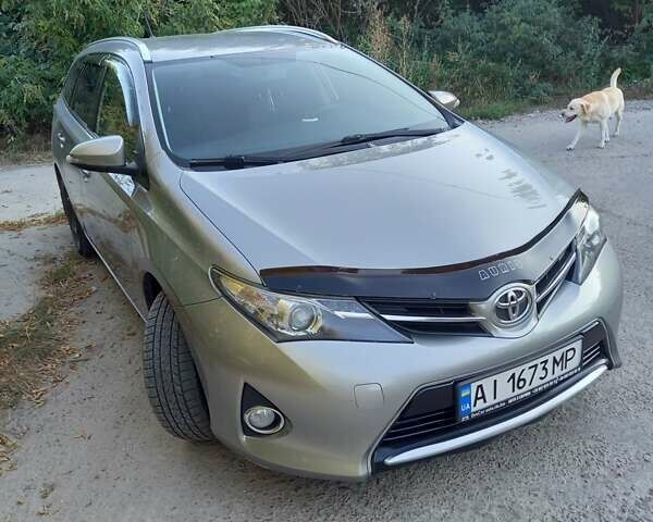 Сірий Тойота Ауріс, об'ємом двигуна 1.6 л та пробігом 212 тис. км за 11800 $, фото 1 на Automoto.ua