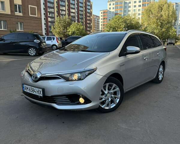 Сірий Тойота Ауріс, об'ємом двигуна 1.8 л та пробігом 257 тис. км за 13200 $, фото 1 на Automoto.ua