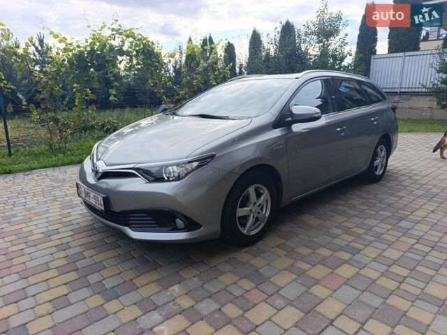 Сірий Тойота Ауріс, об'ємом двигуна 1.8 л та пробігом 163 тис. км за 15999 $, фото 1 на Automoto.ua