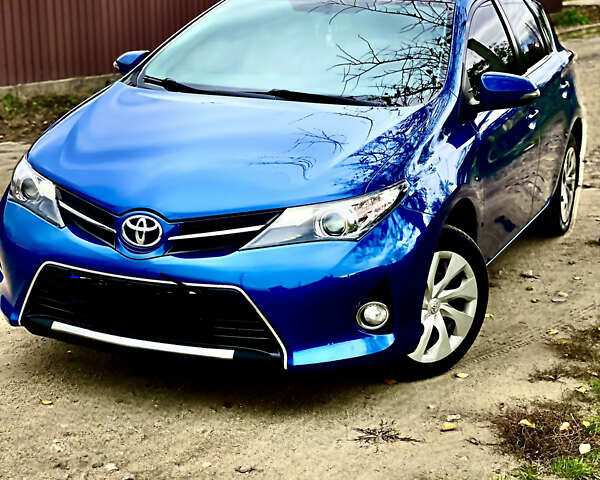 Синий Тойота Аурис, объемом двигателя 1.6 л и пробегом 130 тыс. км за 11999 $, фото 1 на Automoto.ua