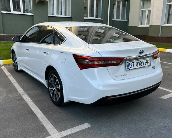 Белый Тойота Авалон, объемом двигателя 2.5 л и пробегом 95 тыс. км за 21500 $, фото 1 на Automoto.ua